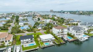 Canal-front home with pool 40 boat slip gated beach access - 1 block to sand