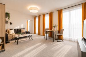 ALURE RESIDENCES 12 & 24h self check-in & private parking next to the apartment building included, CITY CENTER right on SNP Square in a quiet passage, new building, best deal in town