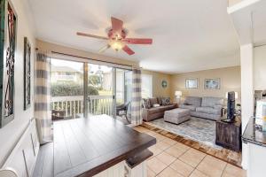 Coastal condo with pool hot tub tennis & golf access - dog-friendly