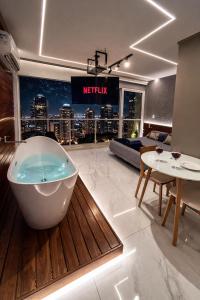 Lindo Studio com Banheira Privativa