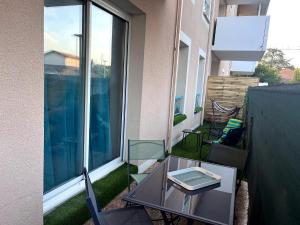 Appt 2 chambres, terrasse, parking, linge inclus