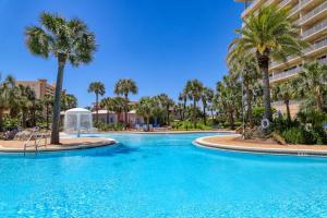 Waterfront resort condo w a shared heated pool fitness room & theater