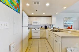 Waterfront resort condo w a shared heated pool fitness room & theater