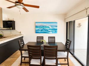 Beachfront condo with loft and sea views