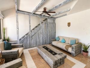 Beachfront condo with loft and sea views