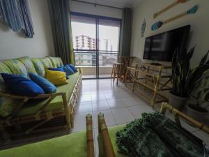 Apto pé na areia da Praia Caiçara, check-in flexível Até 6 pessoas
