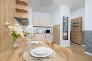 Beige and Pink Apartment in Sosnowiec with Balcony and Desk by Noclegi Renters