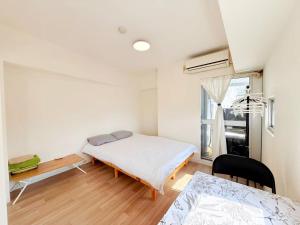 Shinjuku Kabuki Youth Hostel#New Sunshine Room#50 second walk from Higashi Shinjuku subway#Automatic locking door at entrance#新宿1