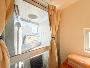 Shinjuku Kabuki Youth Hostel#New Sunshine Room#50 second walk from Higashi Shinjuku subway#Automatic locking door at entrance#新宿12BK