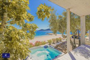 BUQEZ ECO RESORT - Beach Villa 81 - 1st Sea Line by beach