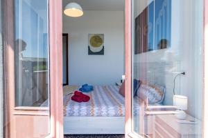 The Lux Apartment - Arona fronte lago- AC - WiFi - By Guestaly