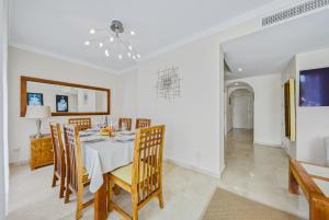 Spacious Penthouse in Elviria with 4 Pools and Large Terrace