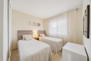 Spacious Penthouse in Elviria with 4 Pools and Large Terrace