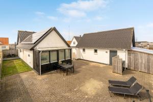 Renovated Holiday Home With Enclosed Terrace, Centrally Located In Vorupør