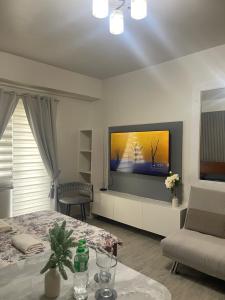 studio with balcony by May