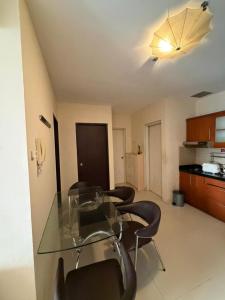Cosmo Mansion Apartemen