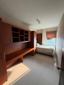 Cosmo Mansion Apartemen
