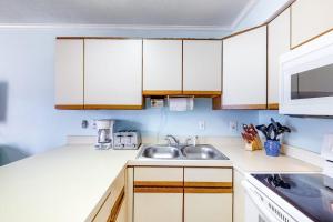 One Block to the Beach Perfectly Located Condo with AC Balcony Shared Pool