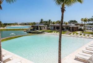 Tropics Golf 1BR H203 Condo with a view of Cana
