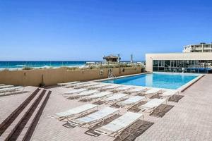 Beachfront Condo with Private Balcony - Shared Pools Hot Tub & Fitness Room