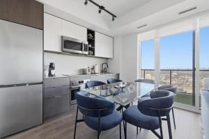 Sleek 2BR Condo with Private Patio & Parking