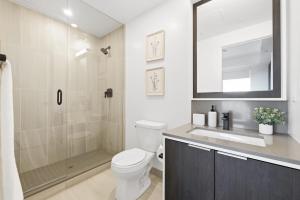 Sleek 2BR Condo with Private Patio & Parking