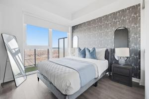 Sleek 2BR Condo with Private Patio & Parking