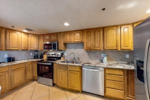 All-suite condo with pool hot tub sauna free WiFi & central AC