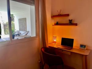 Impeccable large apartment with immense terrace and private garden overlooking the mountain, featuring 2 bedrooms and sleeping up to 4 guests located 100 meters from Plaza Maestranza