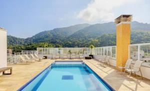 100 metros da praia 2 Suites AC Churrasqueira