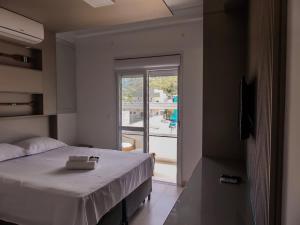 100 metros da praia 2 Suites AC Churrasqueira