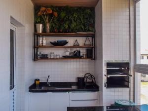 100 metros da praia 2 Suites AC Churrasqueira