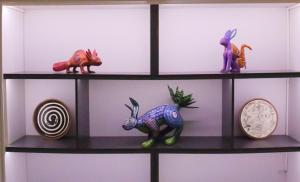 Calli Tochtli Dreaming Among Alebrijes