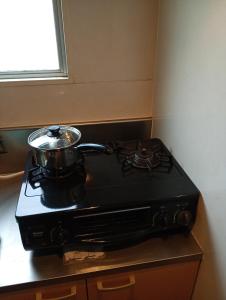 large room with 2double beds next to kuromon market