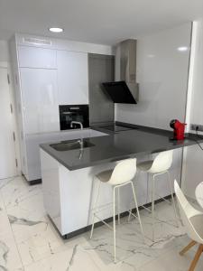 Apartamento con terrazas y vistas al mar