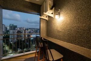 X90 Studio Apartments
