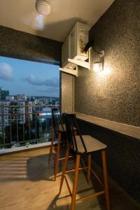 X90 Studio Apartments