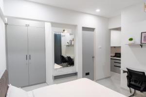 X90 Studio Apartments
