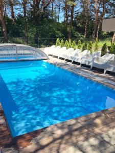 Bangų apartamentai su šildomu baseinu
