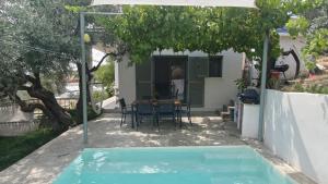 Admonis - Home in the olive grove