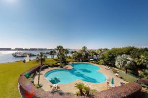 Cozy waterfront condo with central AC beach access on-site pool