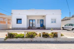 Two beachfront semi detached villas on the sand