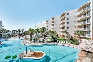 Spacious Beachy Condo On Okaloosa Island w Playground and Two Hot Tubs Access