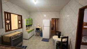 casa de praia check in Aparti de 13 hrs checkout ate 11 hrs
