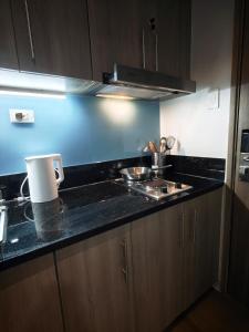 SQUARE SPACE MNL Fame Residences 4 1BR Comfort Stay FREE Parking