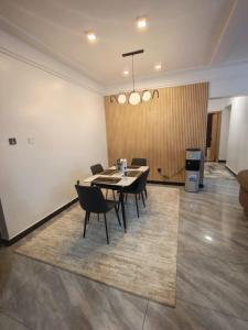 modern serenity suites apartments with swimming pool,modern equipped gym,private parking space, children playing ground, proximity to major shopping malls and unbeatable city views
