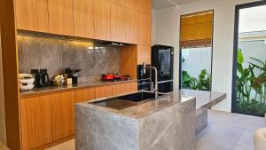 Modern Luxury 4BR Pool Villa by the Sea E1