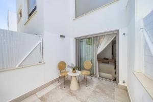 New apartment with a private garden and resort amenities