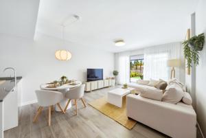 New apartment with a private garden and resort amenities