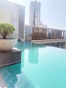 Brown boho with pool and gym